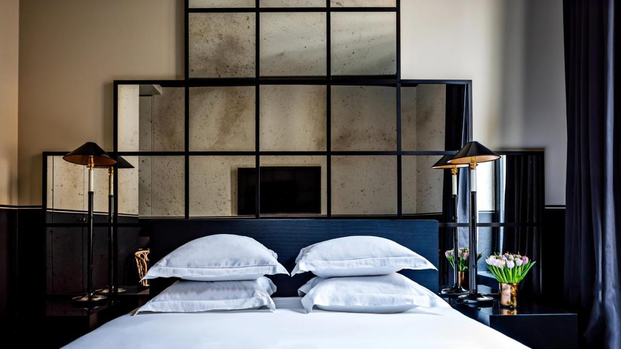 Monsieur George Hotel & Spa - Champs-Elysees Paris Exterior foto A bedroom at the Hotel