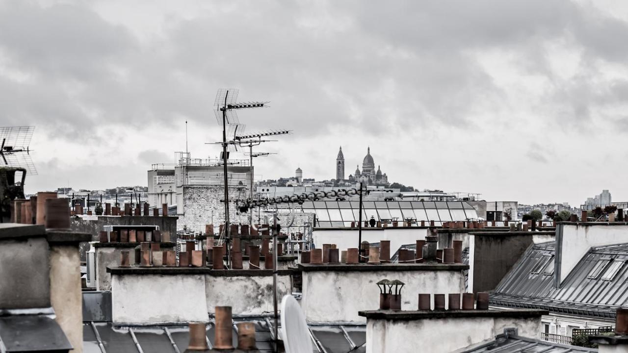 Monsieur George Hotel & Spa - Champs-Elysees Paris Exterior foto View of Paris rooftops