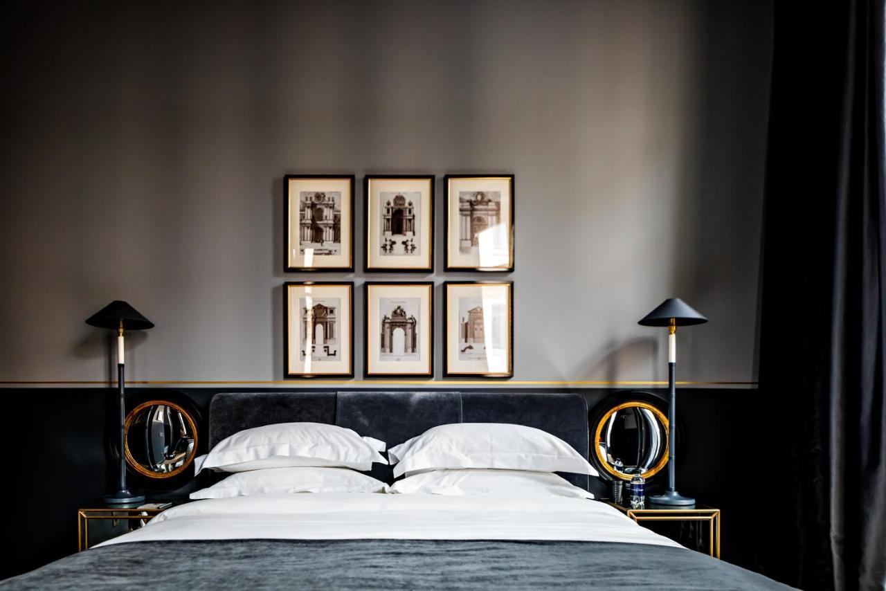 Monsieur George Hotel & Spa - Champs-Elysees Paris Exterior foto A bedroom at the Hotel de Matignon